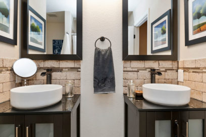 bathroom with dual sinks and modern style